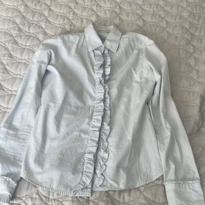 White, black, blue dress shirt.  Looks great with jeans or black pants.